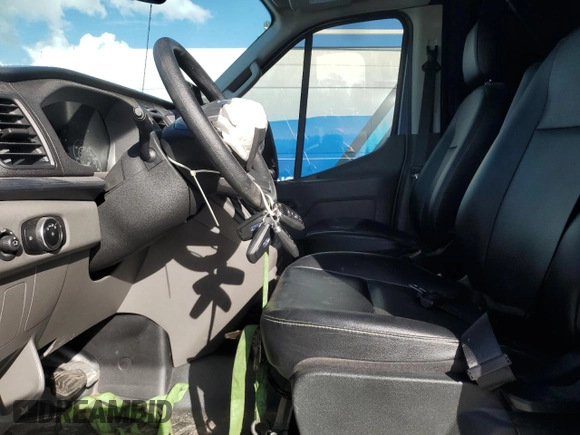 2024 Ford Transit Cargo with VIN 1FTRU8XG8RKA15196, listed as a Copart auction lot 84198984 with 12,267 mi miles and Salvage Title. Bid and sale history available at DreamBid. Image 7.