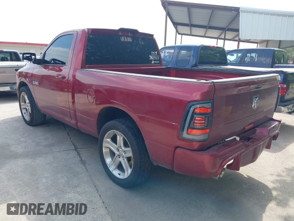 2014 Ram 1500 R/T with VIN 3C6JR6CT5EG153115, listed as a IAAI auction lot 41940587 with 142,323 mi miles. Bid and sale history available at carsss.com. Image 3.