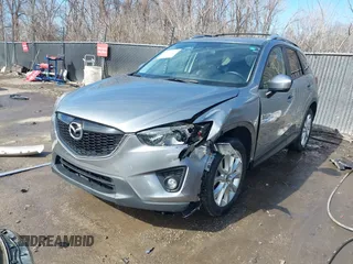 2014 Mazda CX-5 Grand Touring with VIN JM3KE2DY8E0375025, listed as a IAAI auction lot 41657755 with 103,601 mi miles. Bid and sale history available at carsss.com. Image 2.