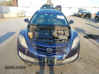 2009 Mazda 6 S Grand Touring with VIN 1YVHP82BX95M21357, listed as a IAAI auction lot 42013043 with 119,701 mi miles and . Bid and sale history available at DreamBid. Image 6.