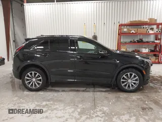2020 Cadillac XT4 AWD Sport with VIN 1GYFZFR43LF090264, listed as a IAAI auction lot 41261586 with 65,859 mi miles and . Bid and sale history available at DreamBid. Image 13.