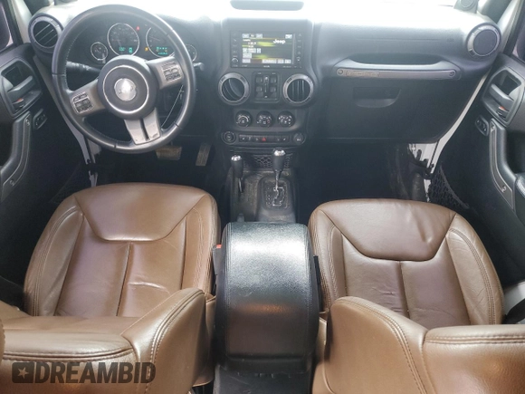 2013 Jeep Wrangler Unlimited Moab with VIN 1C4BJWEG6DL583841, listed as a Copart auction lot 52487915 with 130,369 mi miles and Salvage title. Bid and sale history available at DreamBid. Image 8.