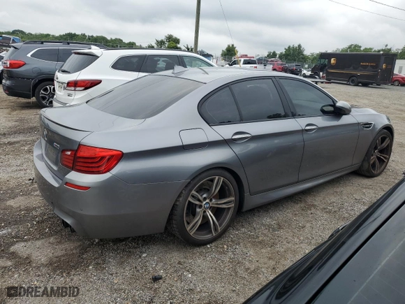 2014 BMW M5 with VIN WBSFV9C52ED593120, listed as a Copart auction lot 64427394 with 80,546 mi miles and Clean Title. Bid and sale history available at carsss.com. Image 3.