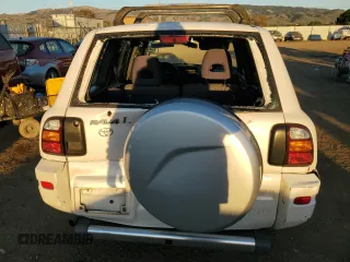 1999 Toyota RAV4 with VIN JT3GP10VXX7053225, listed as a Copart auction lot 87920975 with 228,943 mi miles and Salvage Title. Bid and sale history available at DreamBid. Image 6.
