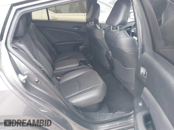 2018 Toyota Prius Plus with VIN JTDKARFPXJ3087064, listed as a IAAI auction lot 41433495 with 118,298 mi miles and . Bid and sale history available at DreamBid. Image 8.