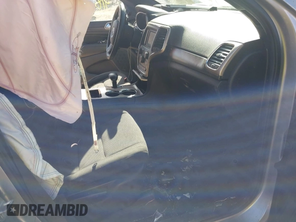 2014 Jeep Grand Cherokee Laredo with VIN 1C4RJFAG0EC289647, listed as a IAAI auction lot 41883914 with 176,501 mi miles and . Bid and sale history available at DreamBid. Image 5.