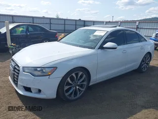 2015 Audi A6 Premium Plus with VIN WAUGFAFC9FN042616, listed as a IAAI auction lot 42496917 with 100,943 mi miles and . Bid and sale history available at DreamBid. Image 2.