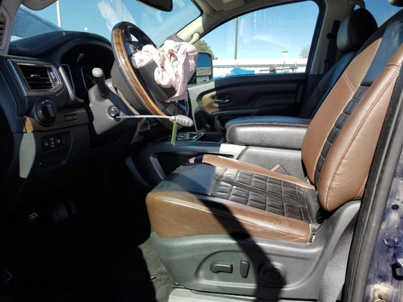 2017 Nissan Titan XD PRO-4X with VIN 1N6BA1F41HN575936, listed as a Copart auction lot 49919955 with 115,416 mi miles and Salvage Title. Bid and sale history available at carsss.com. Image 7.