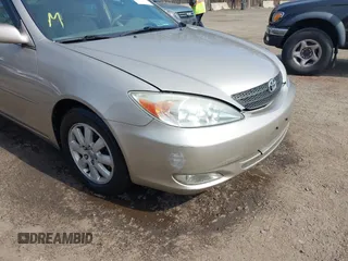 2004 Toyota Camry LE with VIN 4T1BF30K94U587836, listed as a IAAI auction lot 41714277 with 211,893 mi miles and . Bid and sale history available at carsss.com. Image 6.