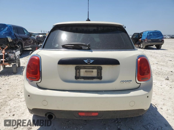 2017 MINI Hardtop 4 Door Cooper z VIN WMWXU1C59H2E18282, wystawiony jako Copart lot #51451895 z przebiegiem 118 919 mil mil oraz Szkoda całkowita • Salvage title. Historia ofert i sprzedaży dostępna na DreamBid. Obrazek 6.