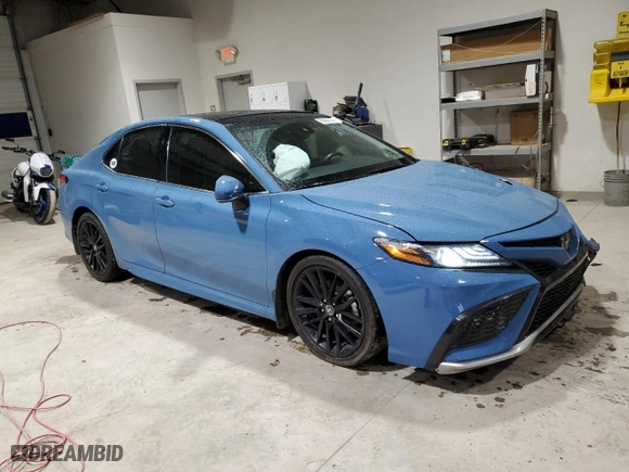 2023 Toyota Camry XSE with VIN 4T1K61BK4PU074743, listed as a Copart auction lot 83037544 with 28,514 mi miles and Salvage Title. Bid and sale history available at carsss.com. Image 4.
