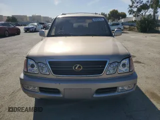 2001 Lexus LX 470 z VIN JTJHT00W213507042, wystawiony jako Copart lot #52634195 z przebiegiem 179 707 mil mil oraz Tytuł czysty. Historia ofert i sprzedaży dostępna na DreamBid. Obrazek 5.