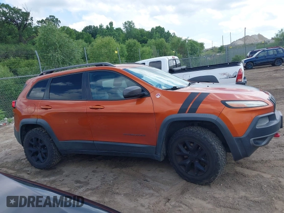 2015 Jeep Cherokee Trailhawk с VIN 1C4PJMBS8FW757154, выставлен на аукционе IAAI как лот 42591946 с пробегом 163 740 миль миль и . История ставок и продаж доступна на DreamBid. Изображение 13.