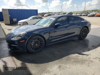 2017 Porsche Panamera with VIN WP0AA2A76HL102129, listed as a Copart auction lot 61036005 with 52,977 mi miles and Salvage title. Bid and sale history available at DreamBid. Image 1.