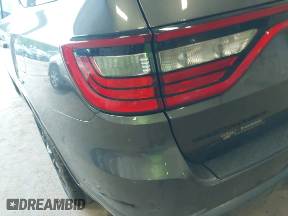 2019 Dodge Durango R/T with VIN 1C4SDJCT0KC550809, listed as a IAAI auction lot 42497698 with 97,236 mi miles and . Bid and sale history available at DreamBid. Image 6.