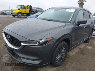 2021 Mazda CX-5 Touring with VIN JM3KFACM6M0480487, listed as a IAAI auction lot 41731646 with 26,951 mi miles and . Bid and sale history available at carsss.com. Image 19.