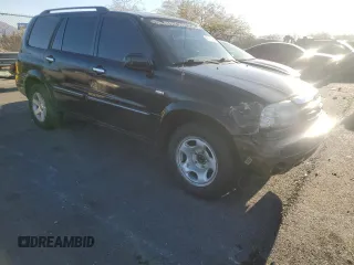 2001 Suzuki XL-7 with VIN JS3TY92V614103969, listed as a Copart auction lot 46933965 with 162,122 mi miles and Salvage Title. Bid and sale history available at carsss.com. Image 4.