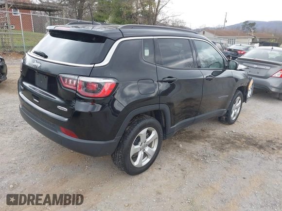 2019 Jeep Compass Latitude with VIN 3C4NJDBB1KT754314, listed as a IAAI auction lot 41869595 with 65,162 mi miles. Bid and sale history available at carsss.com. Image 4.