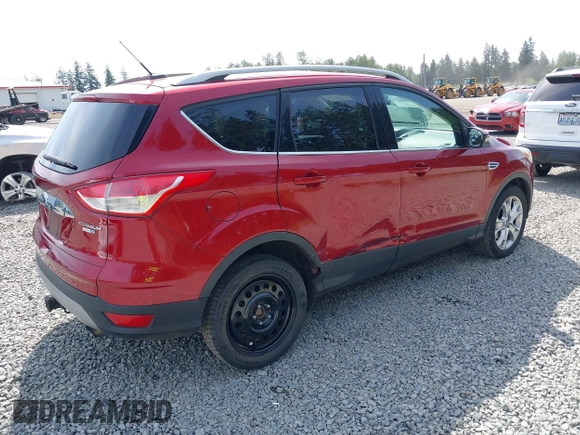 2015 Ford Escape Titanium with VIN 1FMCU9J93FUB28037, listed as a IAAI auction lot 42432345 with 133,242 mi miles and . Bid and sale history available at DreamBid. Image 4.