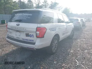 2022 Ford Expedition XLT with VIN 1FMJU1JT1NEA27995, listed as a IAAI auction lot 40935076 with 154,139 mi miles. Bid and sale history available at carsss.com. Image 4.
