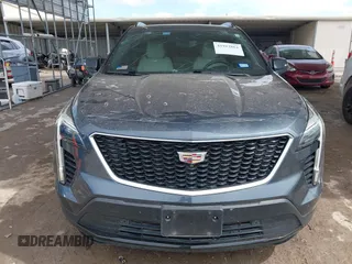 2019 Cadillac XT4 FWD Sport z VIN 1GYFZER49KF215843, wystawiony jako IAAI lot #41912861 z przebiegiem 102 922 mil mil oraz . Historia ofert i sprzedaży dostępna na DreamBid. Obrazek 12.