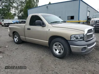 2002 Dodge 1500 with VIN 1D7HA16K52J232739, listed as a Copart auction lot 73134014 with 143,950 mi miles and Salvage Title. Bid and sale history available at DreamBid. Image 4.