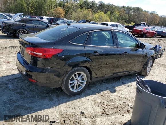 2015 Ford Focus SE with VIN 1FADP3F26FL228606, listed as a Copart auction lot 52525445 with 37,477 mi miles and Salvage Title. Bid and sale history available at DreamBid. Image 3.
