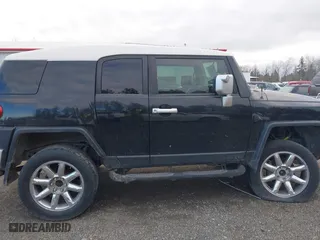 2008 Toyota FJ Cruiser with VIN JTEBU11F780104062, listed as a IAAI auction lot 41010076 with 220,975 mi miles. Bid and sale history available at carsss.com. Image 13.