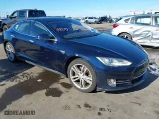 2013 Tesla Model S with VIN 5YJSA1CN5DFP23692, listed as a IAAI auction lot 41337490 with 128,000 mi miles. Bid and sale history available at carsss.com. Image 1.