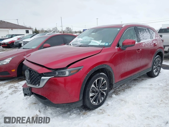 2022 Mazda CX-5 2.5 S Premium Package with VIN JM3KFBDM0N1628116, listed as a IAAI auction lot 41455990 with 29,911 mi miles. Bid and sale history available at carsss.com. Image 2.