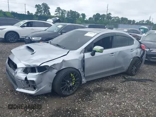 2020 Subaru WRX STI Limited with VIN JF1VA2Y6XL9806022, listed as a IAAI auction lot 39980273 with 143,889 mi miles. Bid and sale history available at carsss.com. Image 2.