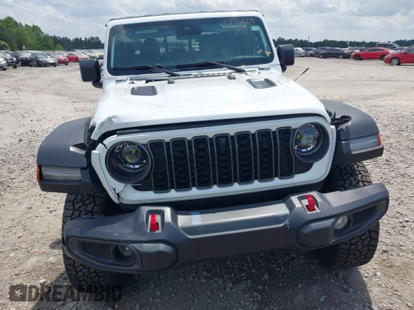 2024 Jeep Gladiator Rubicon z VIN 1C6JJTBG5RL110865, wystawiony jako IAAI lot #42104829 z przebiegiem 6 815 mil mil oraz . Historia ofert i sprzedaży dostępna na DreamBid. Obrazek 6.