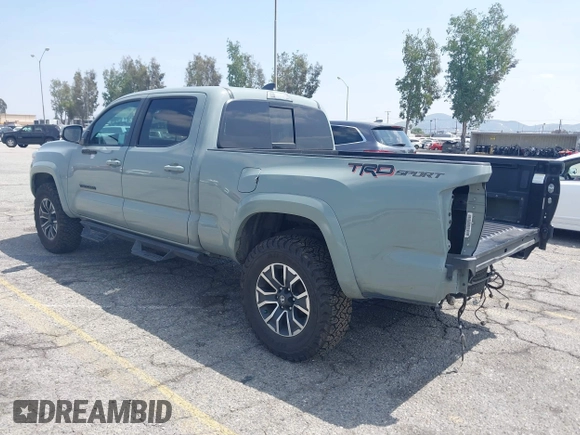 2022 Toyota Tacoma SR5 with VIN 3TMBZ5DN1NM035572, listed as a IAAI auction lot 42083925 with 82,596 mi miles and . Bid and sale history available at DreamBid. Image 3.