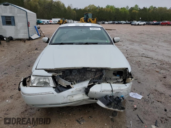 2003 Mercury Grand Marquis GS Convenience z VIN 2MEFM74W53X702387, wystawiony jako Copart lot #52852475 z przebiegiem 246 543 mil mil oraz Szkoda całkowita • Salvage title. Historia ofert i sprzedaży dostępna na DreamBid. Obrazek 5.