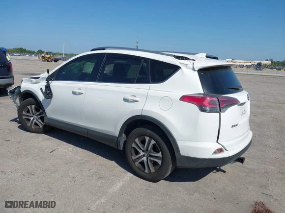 2017 Toyota RAV4 LE with VIN JTMZFREV7HJ143483, listed as a IAAI auction lot 41804683 with 129,319 mi miles. Bid and sale history available at carsss.com. Image 3.
