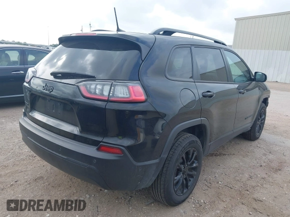2023 Jeep Cherokee Altitude Lux with VIN 1C4PJMMB9PD114936, listed as a IAAI auction lot 42159214 with 59,525 mi miles. Bid and sale history available at carsss.com. Image 4.