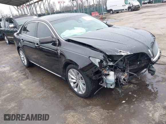 2014 Lincoln MKS with VIN 1LNHL9EK7EG609329, listed as a IAAI auction lot 41555819 with 89,849 mi miles. Bid and sale history available at carsss.com. Image 1.