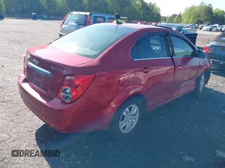 2013 Chevrolet Sonic LT with VIN 1G1JC5SH6D4247624, listed as a IAAI auction lot 41956996 with 144,392 mi miles and . Bid and sale history available at DreamBid. Image 4.