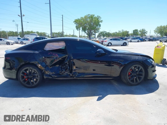 2023 Tesla Model S Plaid with VIN 5YJSA1E67PF528171, listed as a IAAI auction lot 41831086 with Not provided miles and . Bid and sale history available at DreamBid. Image 12.