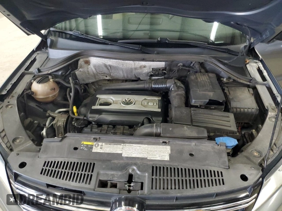 2016 Volkswagen Tiguan S with VIN WVGBV7AX7GW578033, listed as a Copart auction lot 54821755 with 127,317 mi miles and Clean Title. Bid and sale history available at DreamBid. Image 12.