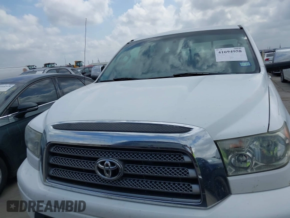 2007 Toyota Tundra Limited z VIN 5TFRV58167X016644, wystawiony jako IAAI lot #41694958 z przebiegiem 233 429 mil mil oraz . Historia ofert i sprzedaży dostępna na DreamBid. Obrazek 12.