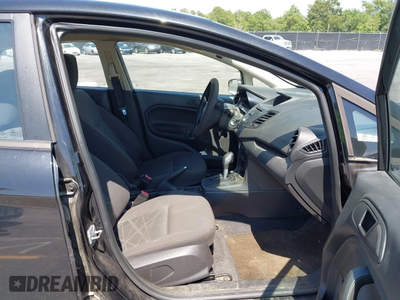 2014 Ford Fiesta S z VIN 3FADP4AJ2EM102020, wystawiony jako IAAI lot #42553222 z przebiegiem 145 052 mil mil oraz . Historia ofert i sprzedaży dostępna na DreamBid. Obrazek 5.