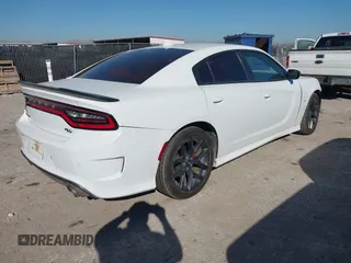 2019 Dodge Charger R/T with VIN 2C3CDXCT9KH629940, listed as a IAAI auction lot 41651890 with 87,628 mi miles and . Bid and sale history available at DreamBid. Image 4.