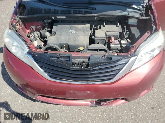 2012 Toyota Sienna LE AAS with VIN 5TDKK3DC7CS195590, listed as a Copart auction lot 57968415 with 201,732 mi miles and Salvage title. Bid and sale history available at DreamBid. Image 12.