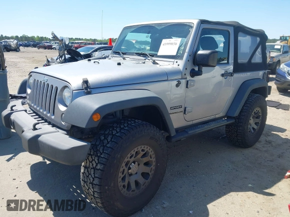 2015 Jeep Wrangler Sport with VIN 1C4AJWAG3FL696988, listed as a IAAI auction lot 41999036 with 79,064 mi miles. Bid and sale history available at carsss.com. Image 2.