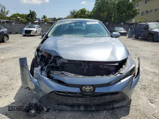 2024 Toyota Corolla LE with VIN 5YFB4MDE4RP099838, listed as a Copart auction lot 50309795 with 10,481 mi miles and Salvage Title. Bid and sale history available at carsss.com. Image 5.
