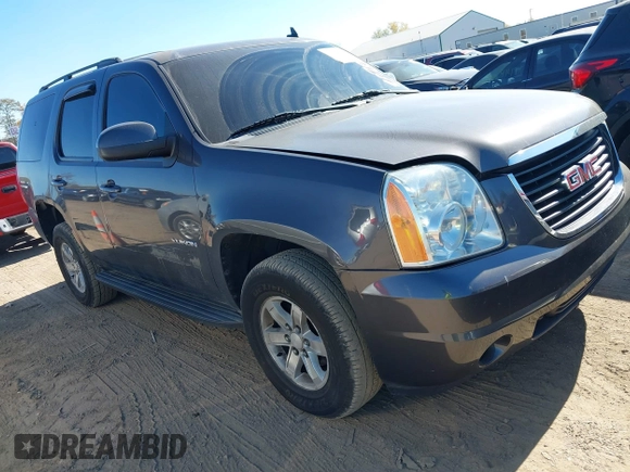 2011 GMC Yukon SLE with VIN 1GKS2AE04BR207818, listed as a IAAI auction lot 40669731 with 312,959 mi miles. Bid and sale history available at carsss.com. Image 1.
