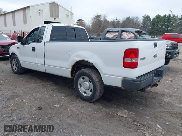 2007 Ford F-150 XL with VIN 1FTRF12257NA47662, listed as a IAAI auction lot 42003991 with 154,502 mi miles. Bid and sale history available at carsss.com. Image 3.
