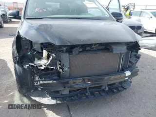 2015 Kia Sedona SX-L with VIN KNDME5C10F6033882, listed as a IAAI auction lot 41808805 with 81,936 mi miles and . Bid and sale history available at DreamBid. Image 6.
