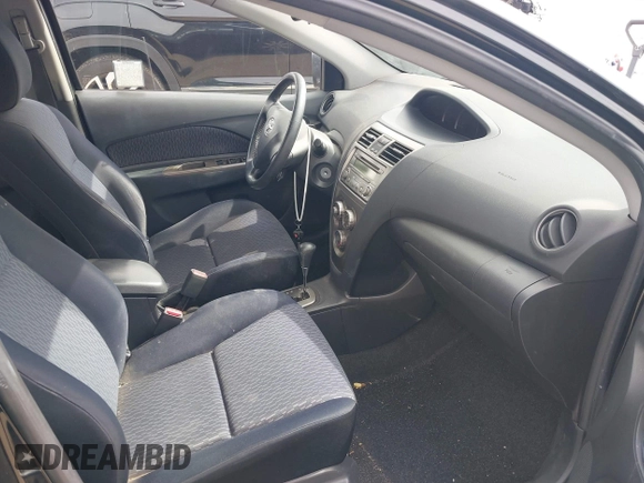 2009 Toyota Yaris with VIN JTDBT903091306668, listed as a IAAI auction lot 41688003 with 161,889 mi miles and . Bid and sale history available at DreamBid. Image 5.